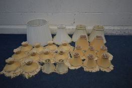 A COLLECTION OF YELLOW AND CREAM LAMP SHADES, to include table lamp and branch lamp shades (24)