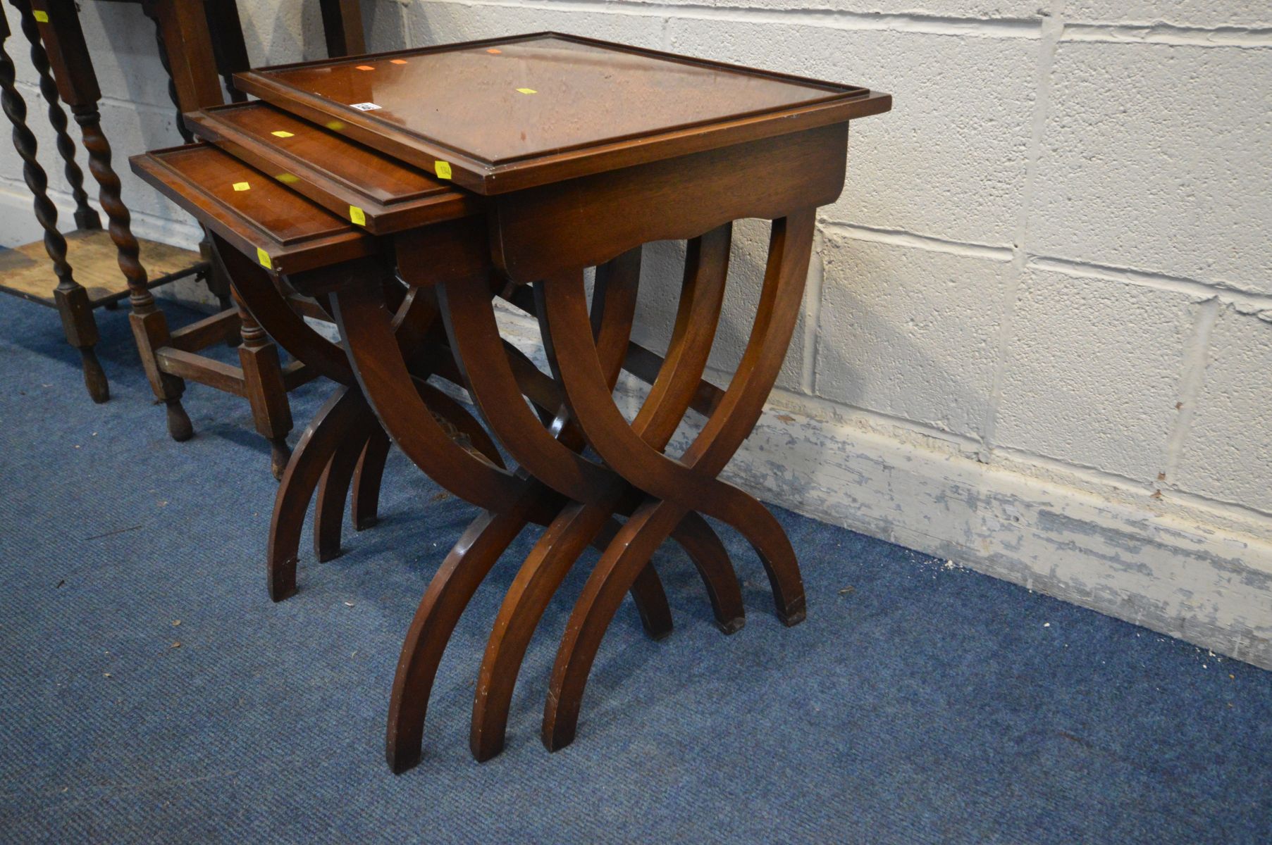 A REPRODUX MAHOGANY NEST OF THREE TABLES, on a cross legged frame, largest table, width 56cm x depth - Image 3 of 3