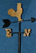 A CAST METAL WEATHER VANE, with gilt painted cockerel finial and gilt painted direction letters,