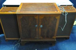 A DYNATRON SRX60 RADIO GRAM in a yewwood cabinet, with two speakers (PAT pass and working but