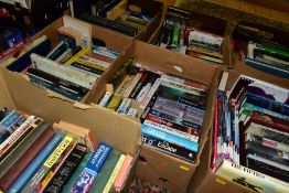 BOOKS, a collection of 200 titles in seven boxes comprising a mixture of hardback and paperback