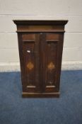 AN EARLY 20TH CENTURY STAINED WALNUT TWO DOOR APOTHECARY CABINET (staining to finish)