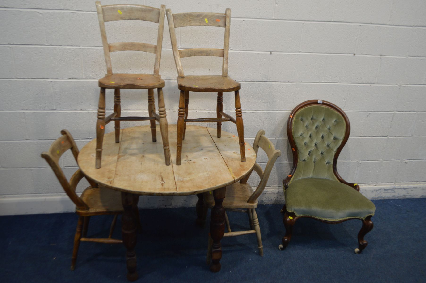 A VICTORIAN MAHOGANY SPOONBACK CHAIR, along with a stripped and stained wood circular dining