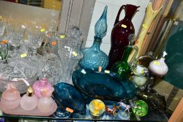 A GROUP OF CLEAR AND COLOURED GLASS WARE, including un-named suites of six cut glass glasses, brandy