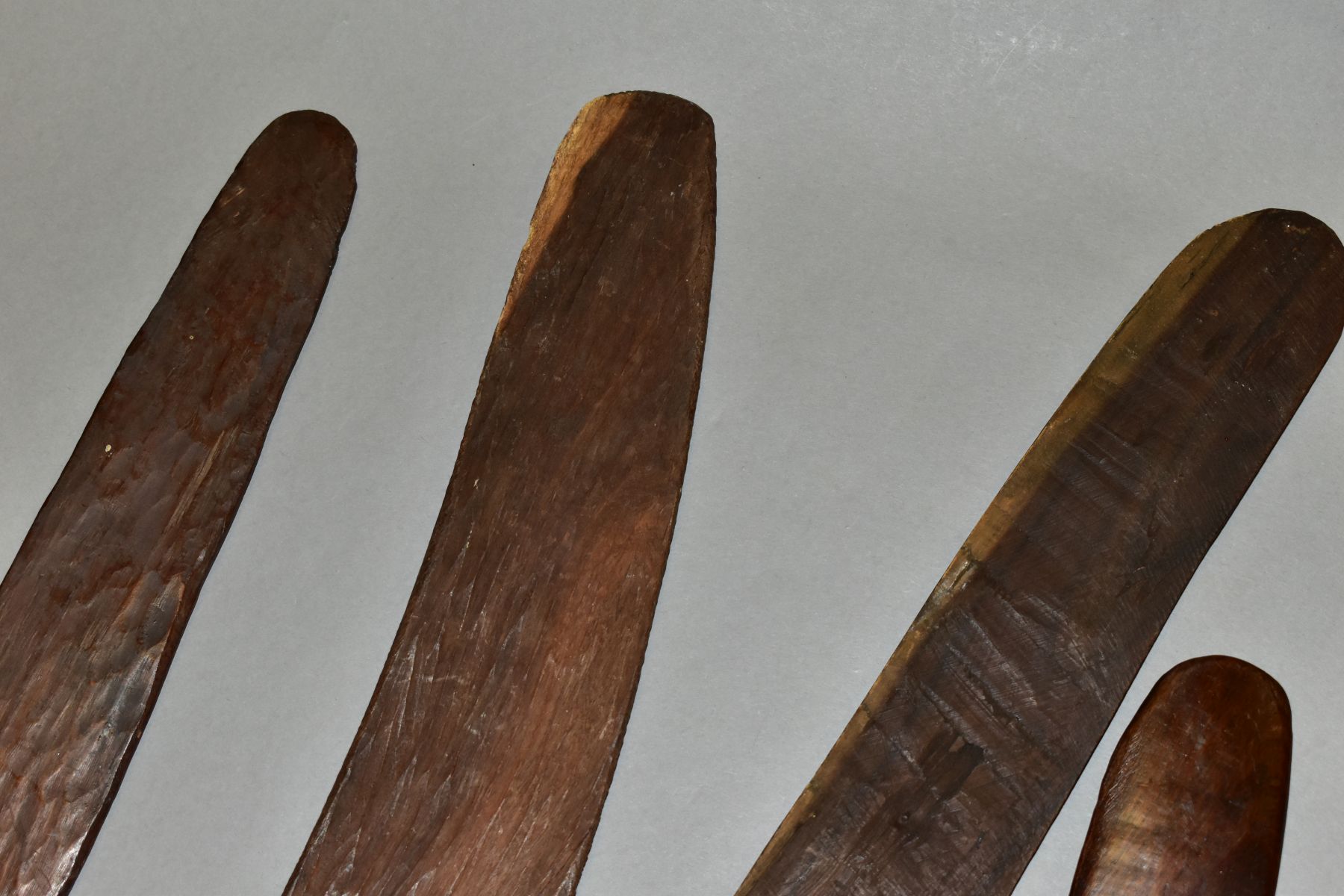 FOUR TRIBAL ART AUSTRALIAN ABORIGINAL BOOMERANGS, to include one carved to the side of arrows, - Image 5 of 9