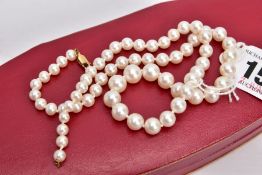 A SINGLE GRADUATED ROW OF AKOYA CULTURED PEARLS, pearls measuring from 5.6mm - 9.1mm in diameter,