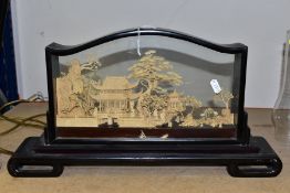 A 20TH CENTURY CHINESE CORK DIORAMA OF PAGODAS IN A LANDSCAPE, in a glazed case with a scrolled