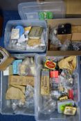 FOUR BOXES OF CLOCK AND WATCH PARTS, to include a box of clock weights, pendulum weights, hands,
