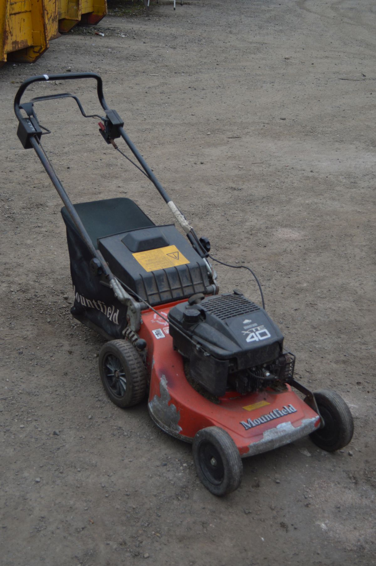 A MOUNTFIELD PETROL SELF PROPELLED LAWNMOWER with grass box