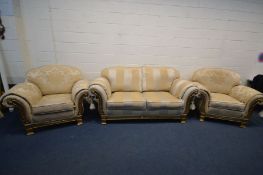 A CONTINENTAL GILTWOOD FRAMED THREE PIECE LOUNGE SUITE, comprising a stripped settee, width 215cm