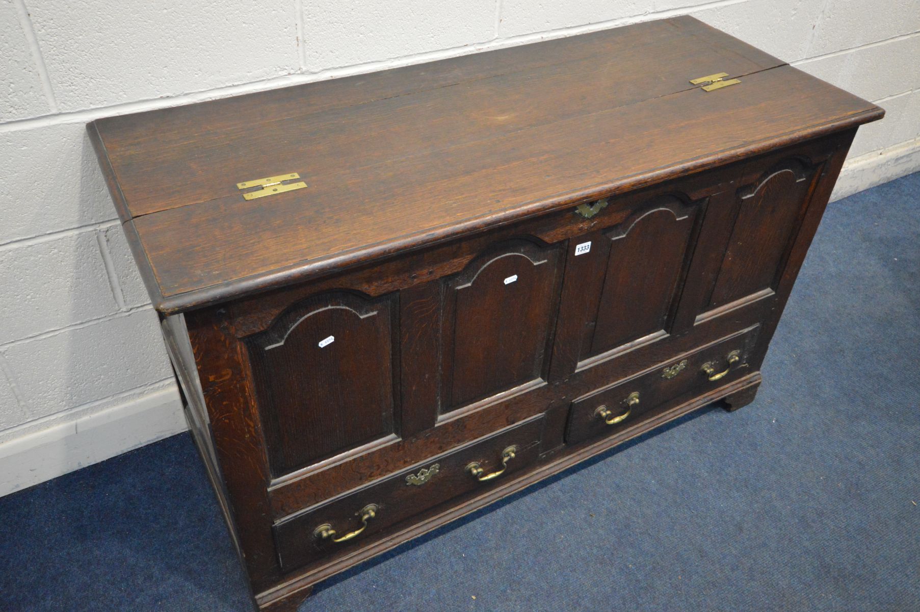 A GEORGIAN OAK MULE CHEST, four fielded panels above two drawers with brass escutcheons and drop - Image 2 of 4