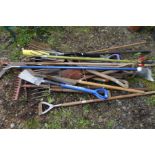 A LARGE COLLECTION OF GARDEN HAND TOOLS, to include forks, spades, rakes, etc