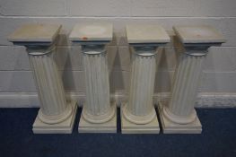 A SET OF FOUR FIBREGLASS GREEK COLUMN TORCHERE STANDS, height 81cm