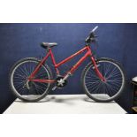 A RALEIGH MAX OGRE 18 LADIES MOUNTAIN BIKE, with 20ins frame, 18 speed Shimano gears with twist grip