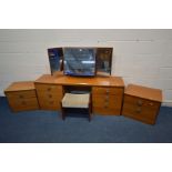 A STAG TEAK FOUR PIECE BEDROOM SUITE comprising a dressing table with a triple mirror, width 163cm x