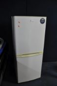 A CANDY FRIDGE FREEZER, width 55cm x height 137cm (PAT pass and working at 5 and -18 degrees)