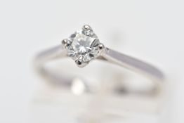 AN 18CT WHITE GOLD SINGLE STONE DIAMOND RING, the brilliant cut diamond within a four claw