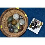 A BASKET AND SMALL BOX OF POLISHED SEMI PRECIOUS SPHERES AND EGGS, of various sizes to include