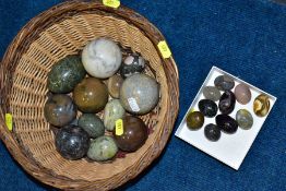 A BASKET AND SMALL BOX OF POLISHED SEMI PRECIOUS SPHERES AND EGGS, of various sizes to include