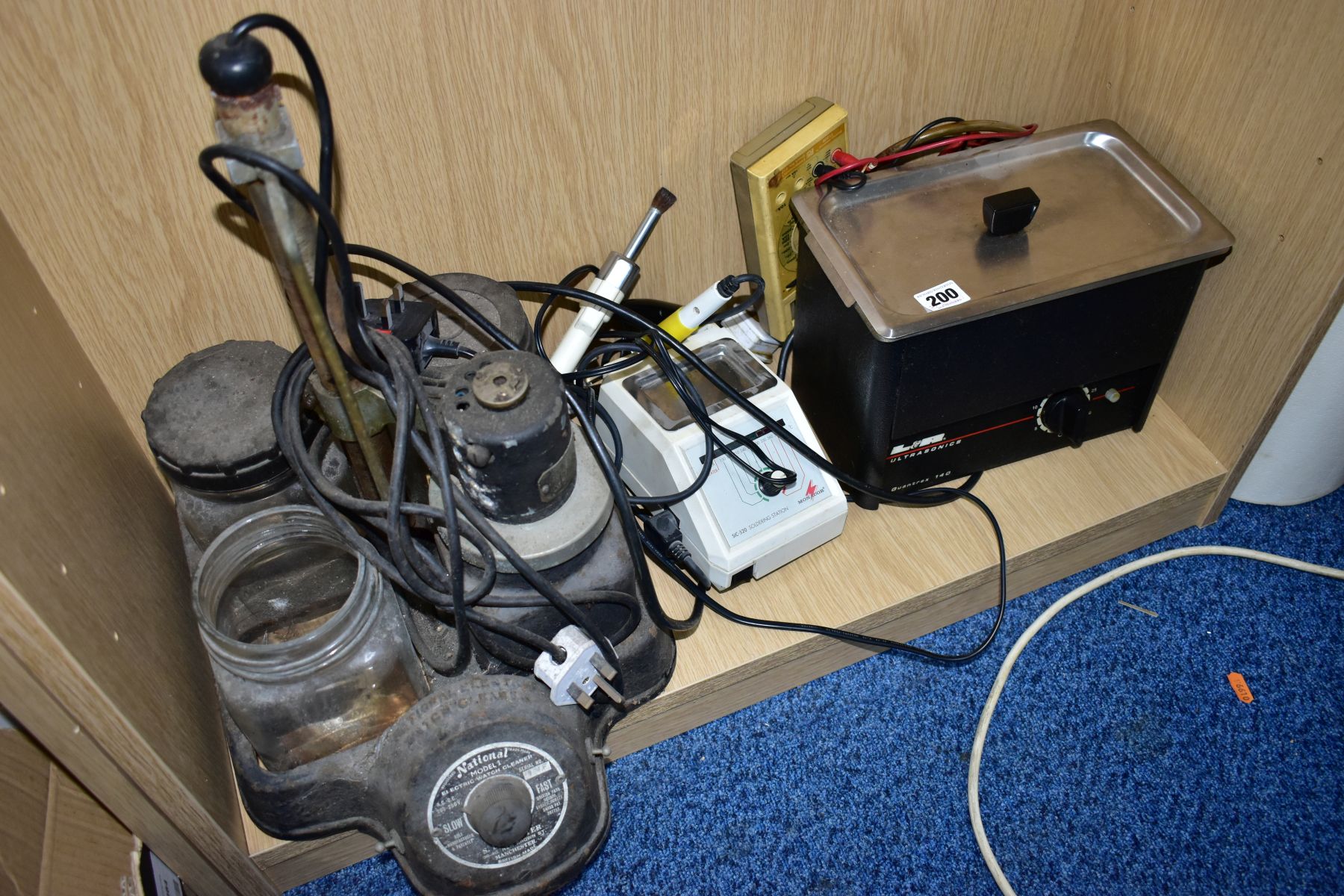 A SELECTION OF WATCHMAKERS EQUIPMENT, to include a 'National Model 1 Electric Watch Cleaner' (a/f