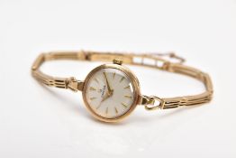 A LADIES 1950'S 9CT GOLD OMEGA WRISTWATCH, the circular face with tapered baton hour markers and