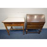 AN EARLY TO MID 20TH CENTURY OAK BUREAU, with a fitted interior (no key) together with a Formica top