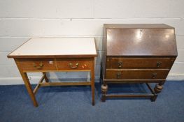 AN EARLY TO MID 20TH CENTURY OAK BUREAU, with a fitted interior (no key) together with a Formica top