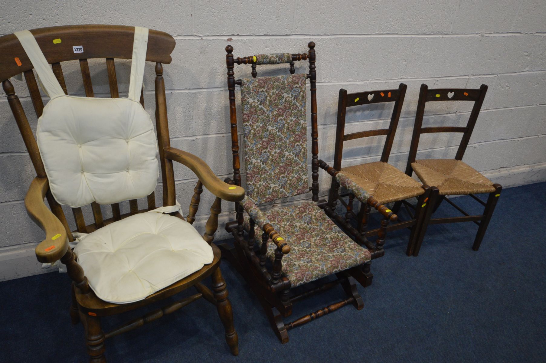 AN EDWARDIAN AMERICAN ROCKING CHAIR, a beech Windsor armchair, a pair of Arts and Crafts oak rush - Image 2 of 3