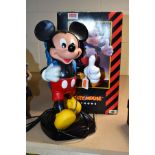 A BOXED TELE CONCEPT MICKEY MOUSE TELEPHONE, modelled as a walking figure with the handset