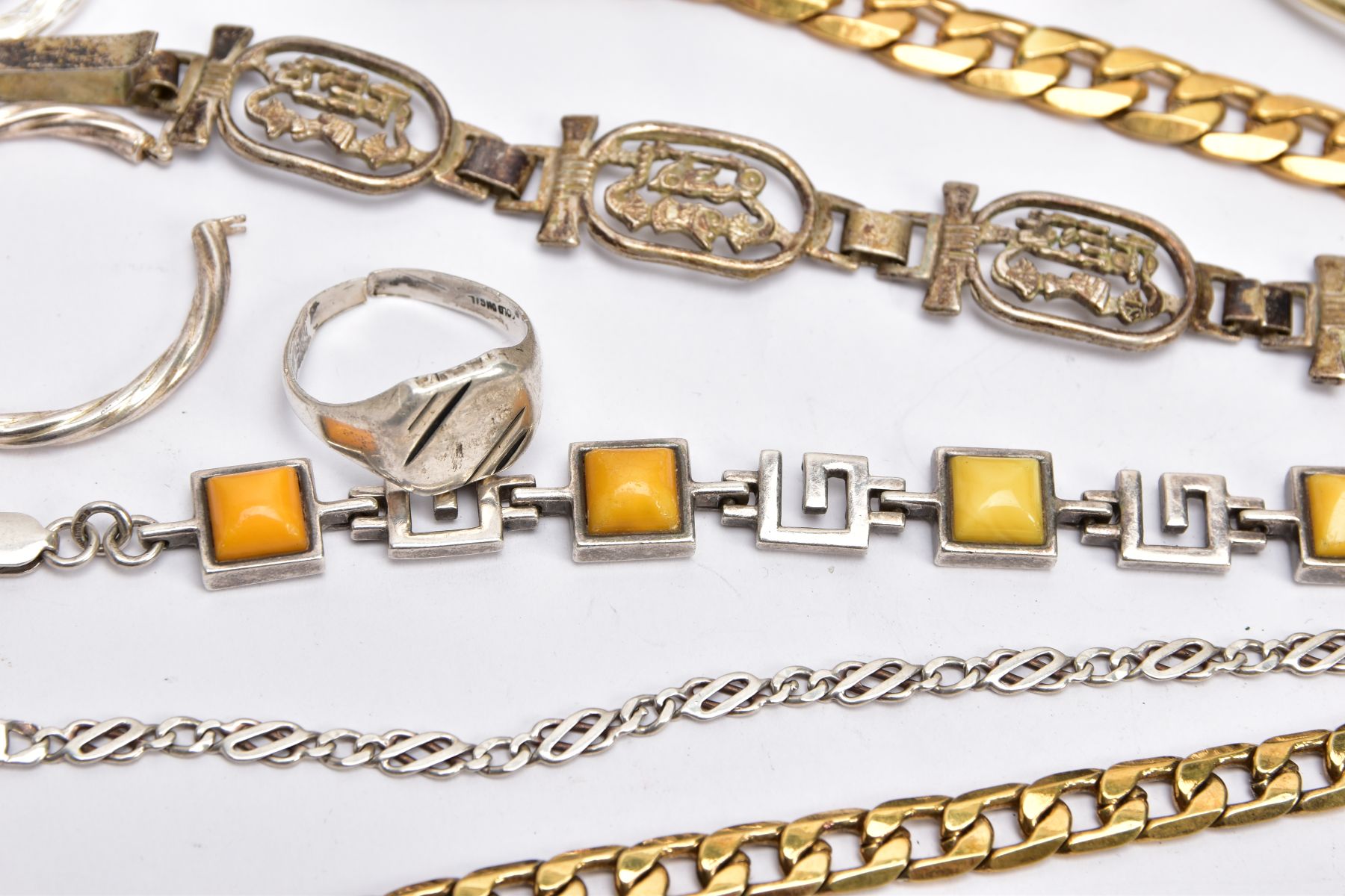 A BAG OF ASSORTED JEWELLERY, to include two gold plated curb link bracelets, each fitted with a - Image 4 of 4