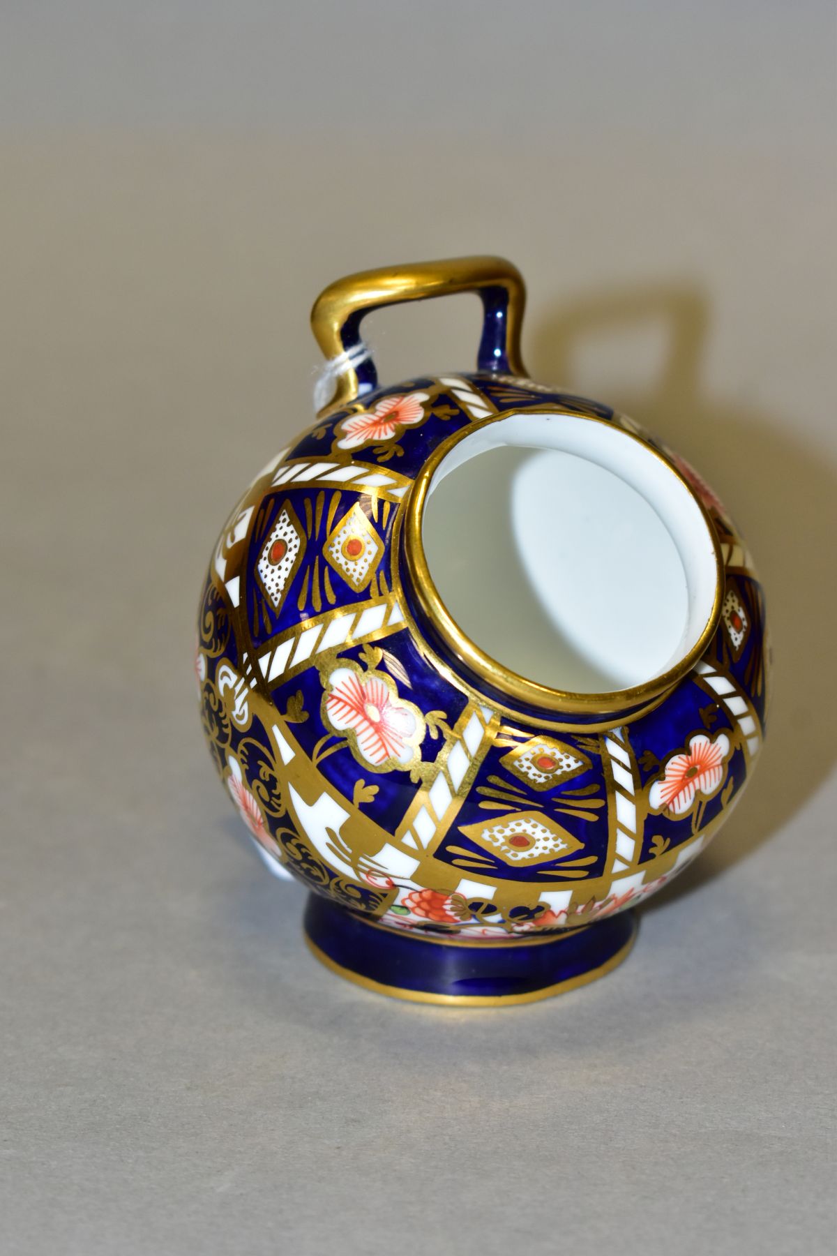 A ROYAL CROWN DERBY IMARI HOD SHAPED VASE, pattern nos 6299/2451, bears date cypher for 1927,