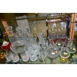 A GROUP OF COLOURED AND CUT GLASSWARES, to include a two bottled tantalus, total height 34cm, with