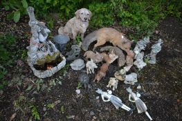 A COLLECTION OF PLASTIC GARDEN ORGANMENTS, to include a four foxes, two squirrels, seated Labrador