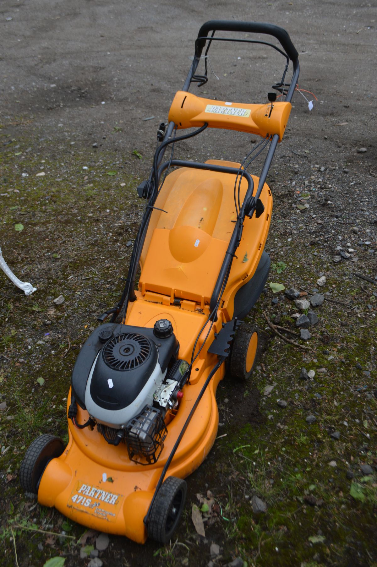 A PARTNER 417S PETROL SELF PROPELLED LAWNMOWER with grass box (pulls freely, engine turns but not