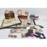 A BOX CONTAINING COINS, COIN ALBUMS COMMEMORATIVES to include two albums with 20th Century half