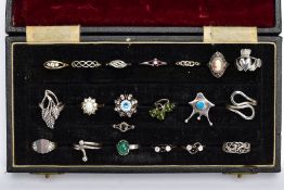 A RING BOX WITH SILVER AND WHITE METAL RINGS, to include twenty rings in total, such as a silver
