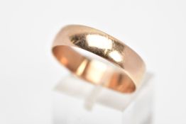 A 9CT GOLD WIDE BAND RING, of a plain polished design, approximate width 5.5mm, hallmarked 9ct