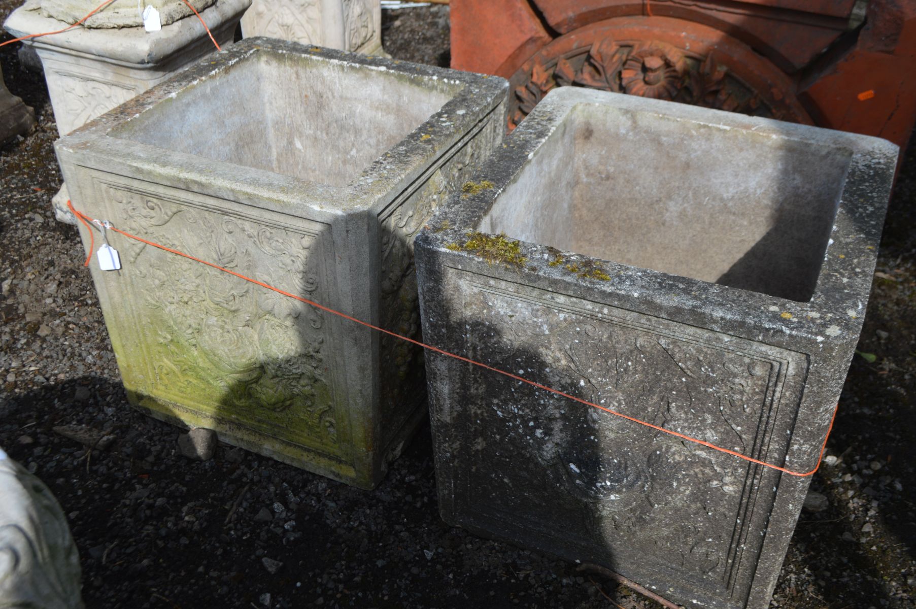 A PAIR OF COMPOSITE SQUARE PLANTERS, with a bouquet of flowers decorated to each panel, 43cm squared - Image 2 of 4