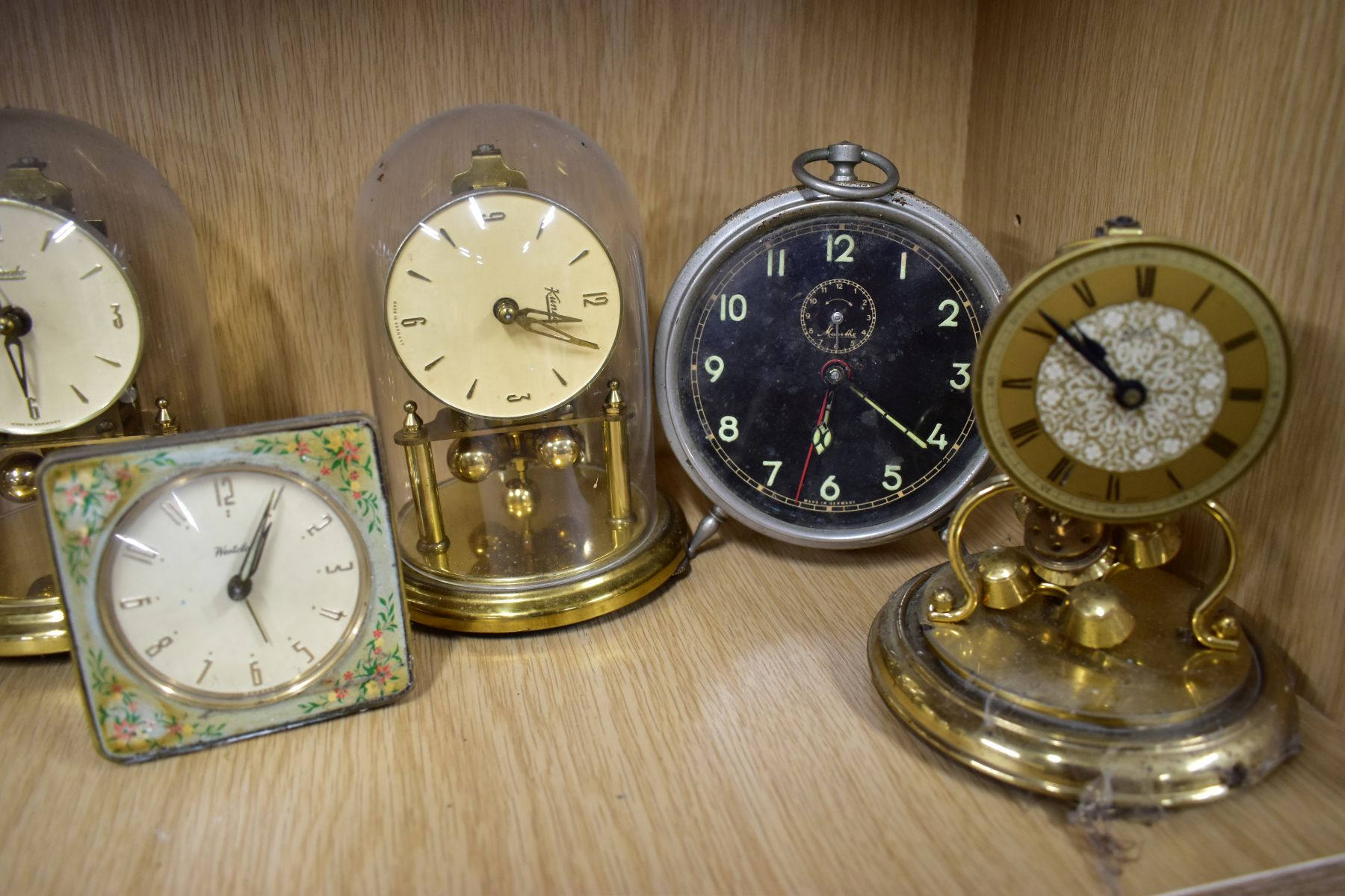 NINETEEN MANTLE AND BEDSIDE CLOCKS, to include four plastic domed rotating pendulum clocks, such - Image 7 of 7