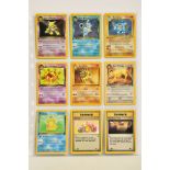 A QUANTITY OF POKEMON CARDS, just over 100 Pokemon TCG cards from Base Set, Base Set 2, Fossil,