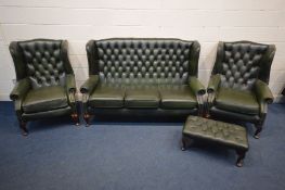 A FOUR PIECE GREEN LEATHER CHESTERFIELD SUITE, comprising a winged settee, width 170cm and a pair of