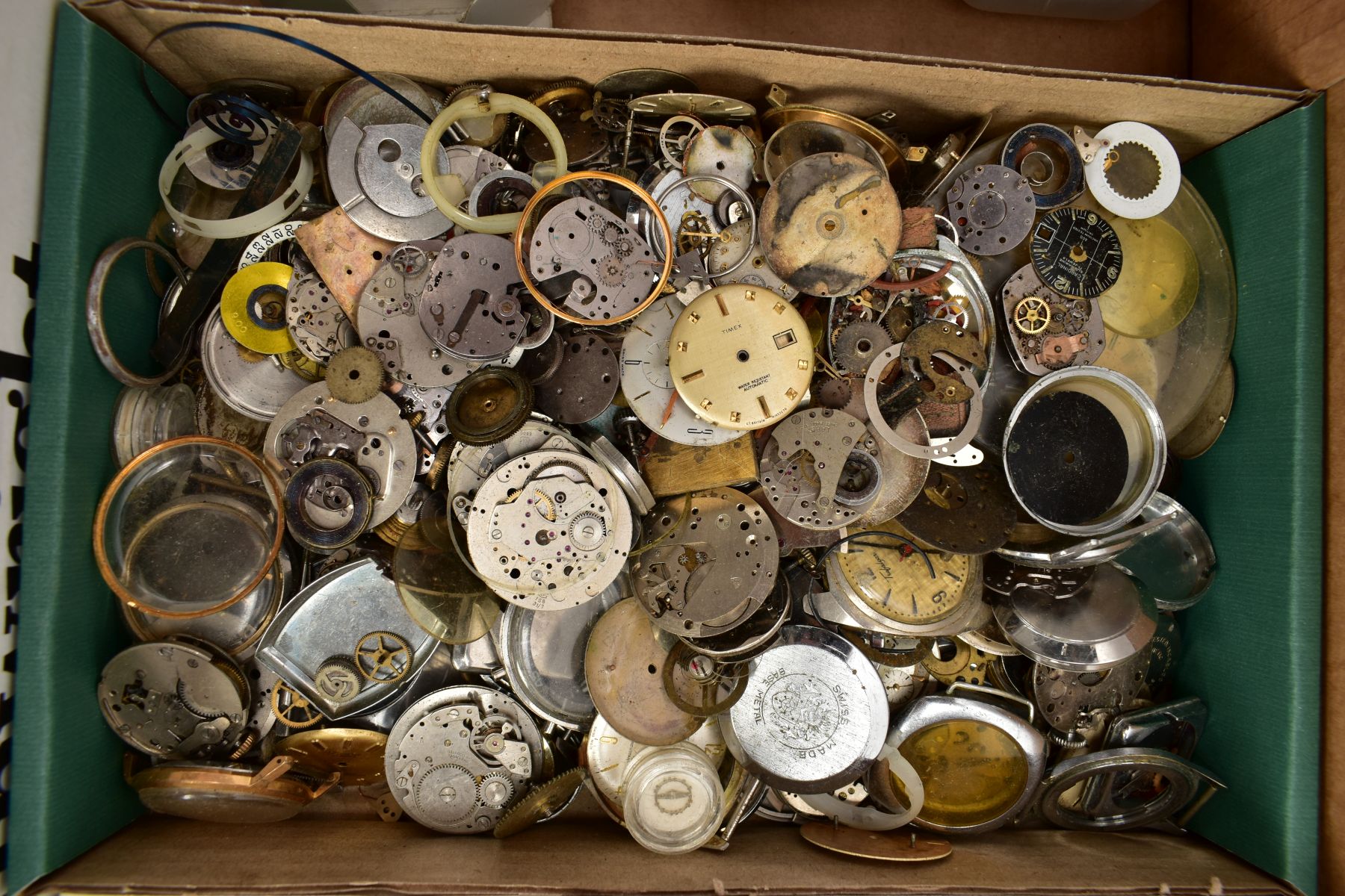 A BOX OF DECONSTRUCTED WATCHES, MOVEMENTS AND CASES, to include a Longines case back engraved with a - Image 4 of 9