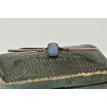 A YELLOW METAL OPAL BAR BROOCH, designed with an emerald cut opal cabochon, milgrain collet mount,