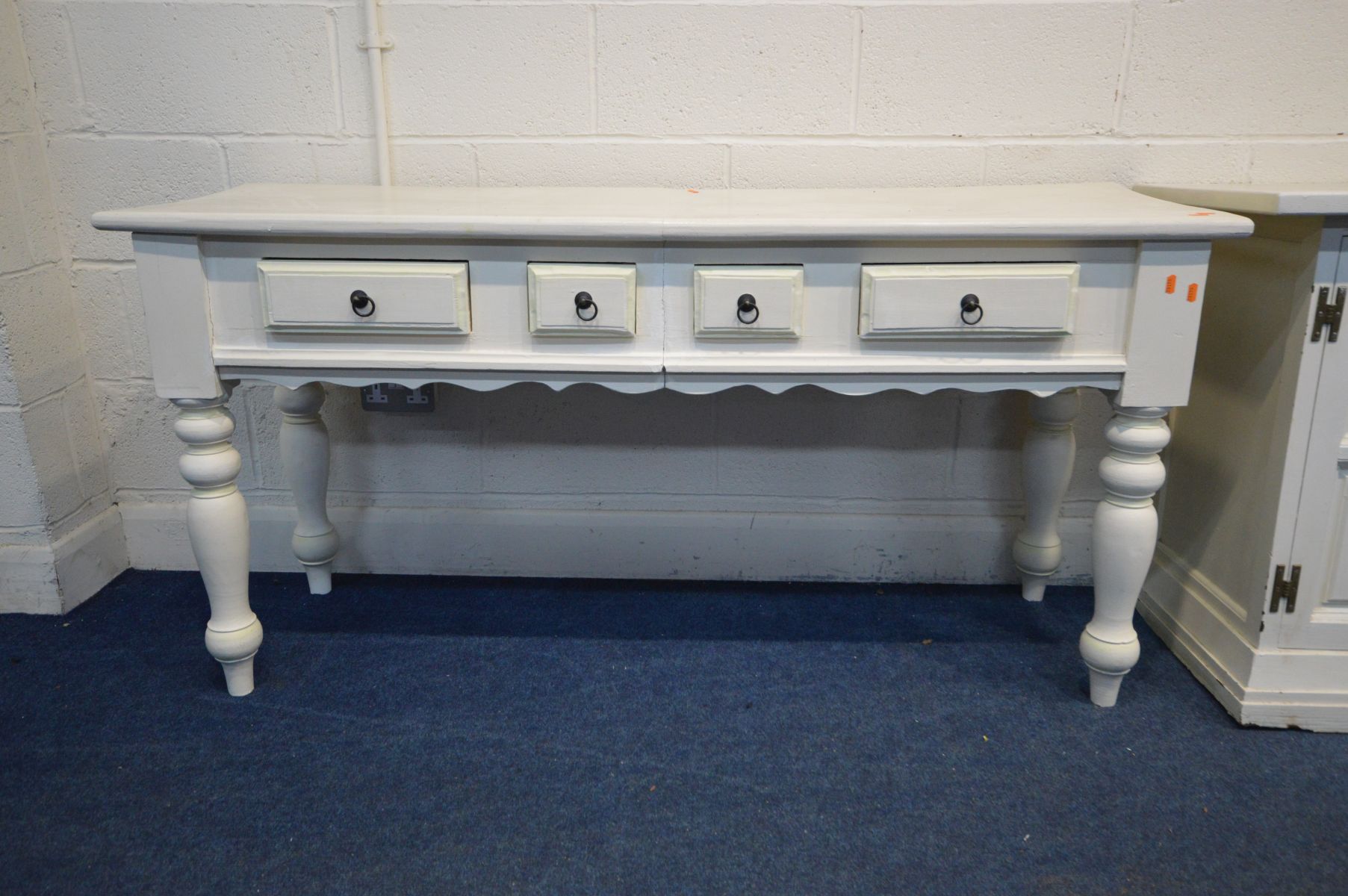 A LATE 20TH CENTURY SIDEBOARD, with four drawers flanked by fielded panelled doors, brass back - Image 4 of 4