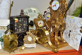 ELEVEN VARIOUS CLOCKS, all with quartz movements, including two wall clocks, a Churchill mantel