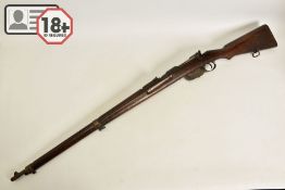 A STEYR MANNLICHER MODEL 95 MILITARY RIFLE CONVERTED TO .410'', the magazine had a plate welded