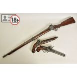 THREE WHITE METAL COPIES OF ANTIQUE FIREARMS, the first is a copy of a Miquelet flintlock pistol