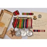 AN OFFICIAL BOXED GROUP OF WWII/GENERAL SERVICE MEDALS to include Burma Star, Defence & War medal (