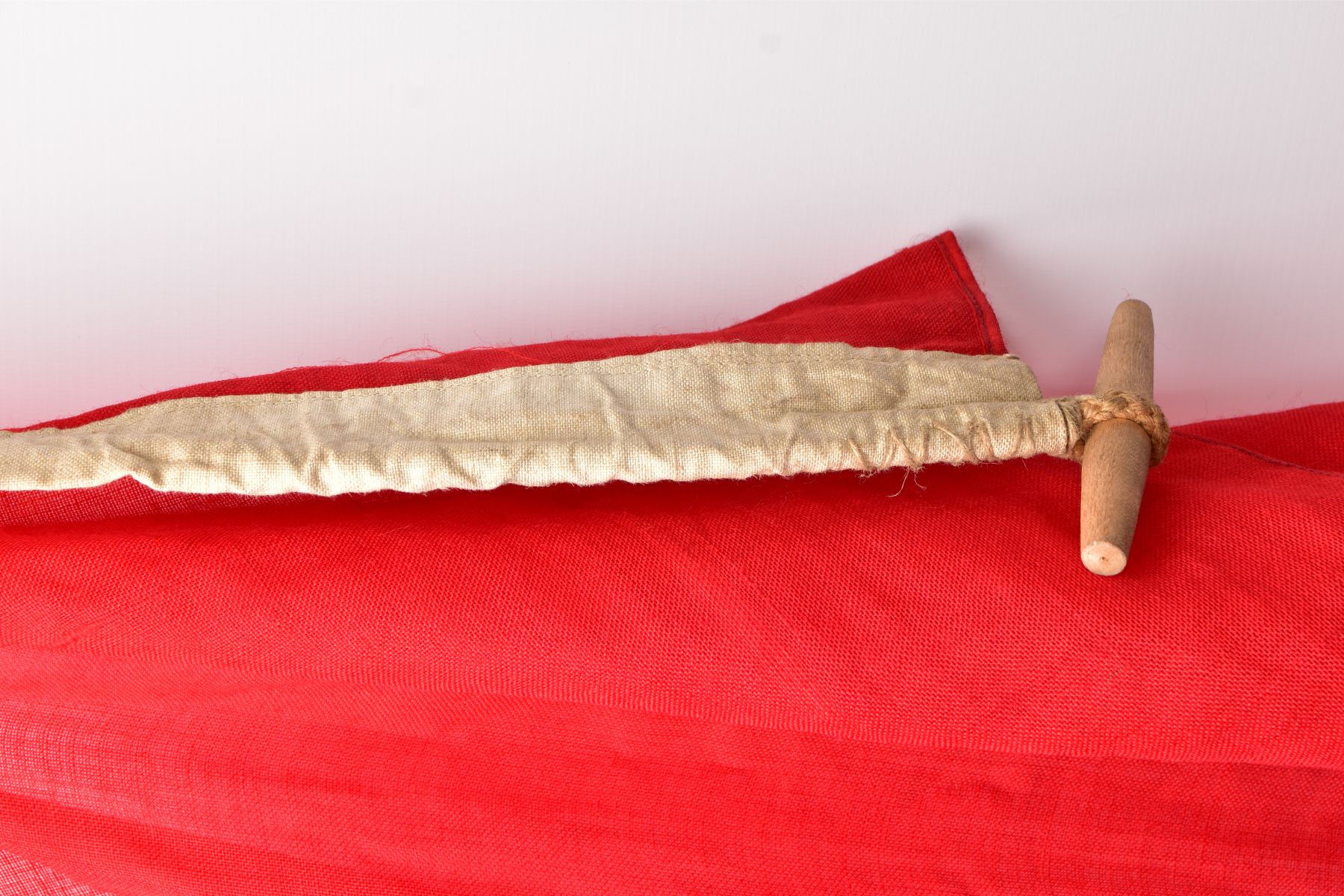 A LARGE RED/GOLD COLOURED RUSSIAN (CCCP) FLAG, approximately six feet x eight feet, corded and bound - Image 2 of 3