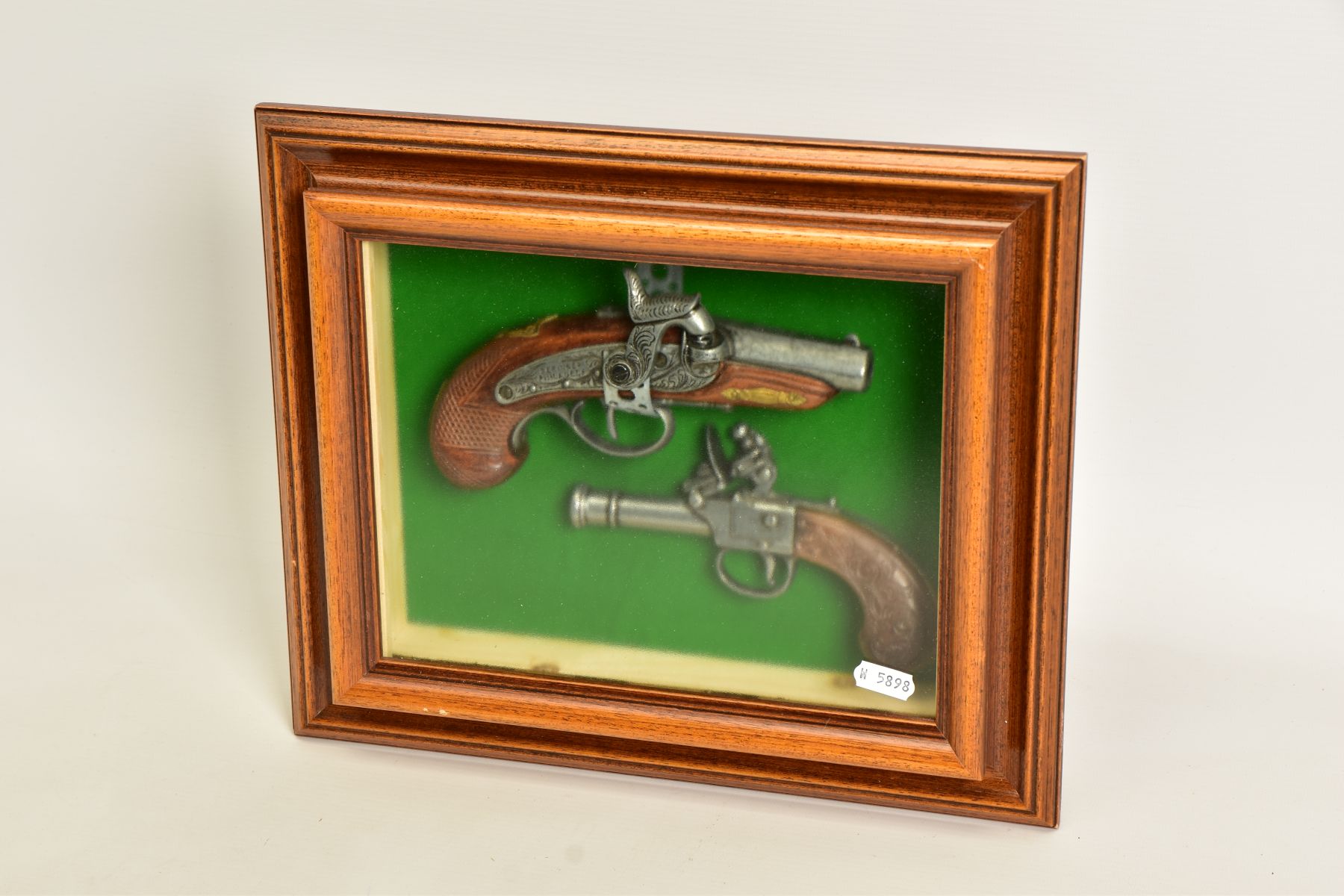 A NEATLY FRAMED DISPLAY CASE containing a white metal replica of a percussion American derringer and - Image 3 of 3